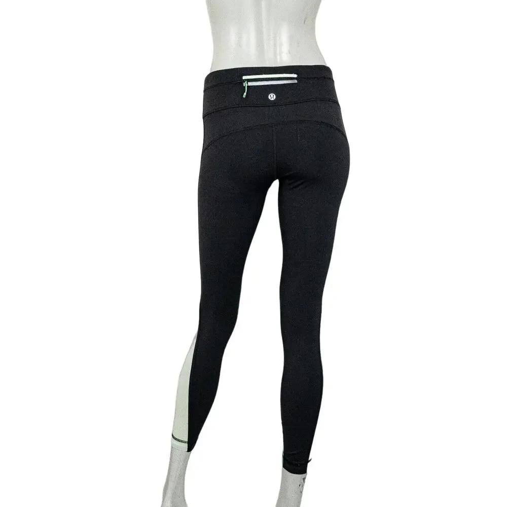 Lululemon two tone Green Black Leggings mesh side size 4